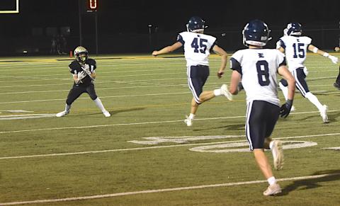 Gary Corsair • Clay County Progress Rylan Graves gathers a third-down pass from Peyton McGaha for a 36-yard gain that caught Enka totally unaware.