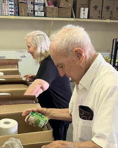 Photo • Clay County Food Pantry president, Jerry Sullivan From left, Dave Jaeger with his wife, Judy Jaeger, sort canned goods for the Clay County Food Pantry. 
