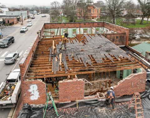 Photo by Ron Wallace Demolition beginning in the upstairs of the old building on the corner of Herbert Street.