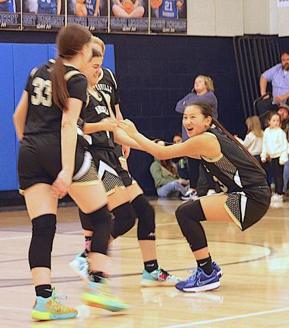 Neal Wachob • Clay County Progress Lucy Trout is helped up by Hayesville teammate Micalynn McClure, No. 10, after Trout collided with a Nantahala Eagle as Ava Moore and Jasmine Brooks, No. 33, come to help.
