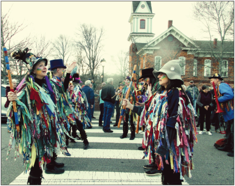 The John C Campbell Folk School Morris Dancers showed their unique skills down Sanderson Street during the Mardi Gras Parade in 2025.