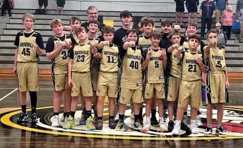 The Hayesville Mites are, from front left, Luke Brooks, Jon David Ray, Gabe Garcia, Martin Ledford, Linkin Blizzard, Maxx Colandrea and Elam Fuerch; center, Eli Payne, Finn Hensley, Max Moore, Gage Jones, Elijah Hughes and Candler Matheson; back, coaches Slade Crouch, Michael Colandrea and Mark Moore.