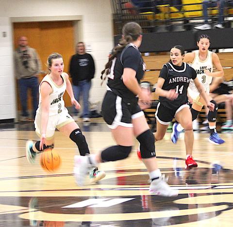 Neal Wacob • Clay County Progress Ava Shook, No. 2, and Lucy Trout, No. 3, turn on their jets during a Lady Jackets fast break against Andrews.