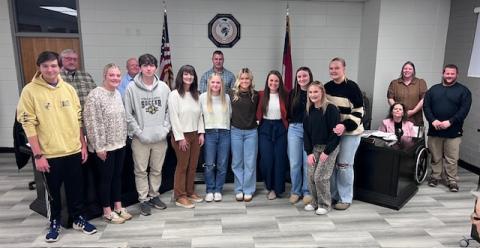 Angel Owens • Photo Clay County Schools students and teachers are, front, from left, Will Jennings, Lily McClure, Zach Moral, Teacher Michelle Rhinehardt, Jadyn Kimber, Marleigh Lowe, Teacher Kayla Clonts, Jasmin Brooks, Madison Sullivan and Ava Moore. They were recognized during the Board of Education meeting on Monday, Feb. 23. School board members are, back, from left, Danny Jones, Robert Caldwell, Chairman Jason Shook, Board Member Kelly Crawford, Superintendent Melissa Godfrey and Board Member Josh Ash