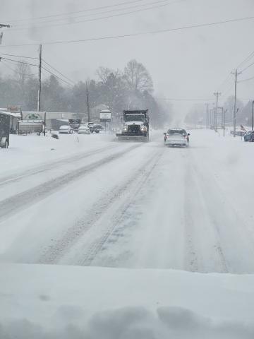 Gracie Taylor • Clay County Progress Clay County DOT truck scrapes Highway 64 west near the Jacky Jones Ford dealership.