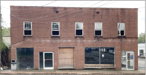 The old West Auto building which was originally a hotel and cafe has been demolished to make room for the Hayesville Inn on the Square. CCCRA members are hoping the public will send in any old photos of the building and its businesses.