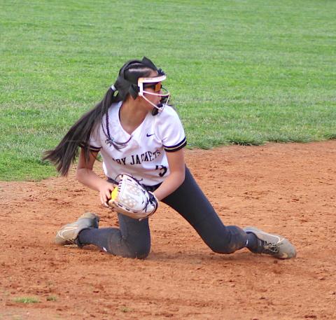 Neal Wachob • Clay County Progress Hayesville shortstop Lucy Trout gets down to stop a hot grounder at Robbinsville.