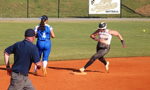 It's full speed ahead for Danielle Anderson as she rounds second and sets sail for third base.