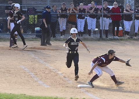 Photo by Gary Corsair Believe it or not, Hayesville’s Micalynn McClure, No. 11, was called out on this hard-hit grounder to second base that ended the game against Swain County.