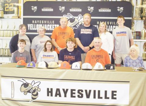 Front from left, Rhett, Tessa, Jackson, Joe Jack and Edna Mae Sellers; back Carrissa Daniels, Denise and Charlie Shelton, Rob, Marissa and Matthew Peck are witnessing Jackson's signing with Caldwell Community College.