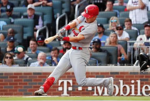 St. Louis Cardinals’ Tommy Edman doubles to score teammates Marcell Ozuna and Yadier Molina during the first inning of Game 5 of the National League Division Series baseball game against the Atlanta Braves on Wednesday in Atlanta. John Bazemore/Associated Press