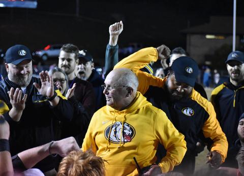 Coach David Gentry celebrates with coaches and fans after winnings his 413th game at Swain County on Friday night.