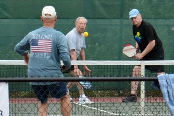 (Sally Brock • Clay County Progress) Fred Sickel, left and Steve Champ battle the competition on their way to gold in their age bracket.