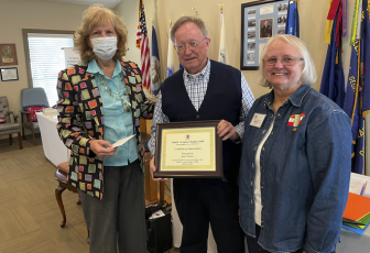 Left, Chapter First Vice President Elizabeth Salvatore and right, Chapter President Jeanette Earle presents local historian, Jerry Taylor, a certificate of appreciation.