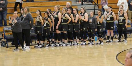 Photo by Kendra Coker Hayesville Middle School Lady Jackets shows respect during the Pledge of Allegiance.
