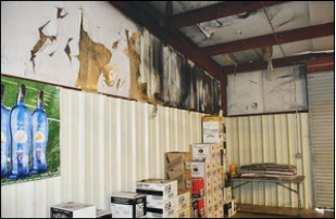 Photo submitted A Sunday fi re in the storage area of the Clay County ABC Store resulted in heavy smoke damage to the interior. A 17-year-old male has been charged in connection to the fire.