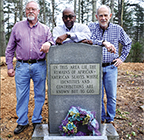 Becky Long • Clay County Progress Among the committee members working to improve Freedom Cemetery are Commissioner Clay Logan, Pastor Harold Holbrook Jr. and George Gains who gathered at the cemetery’s marker that had been placed by the Clay County Historical & Arts Council. The group is raising money to preserve and enhance the historical site.