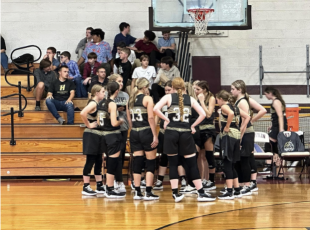Hayesville Middle School Lady Jackets prepare their ultimate strategies during game.