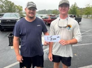 Jeremy Cross and Logan Russell are winners in the Clay Masonic Lodge fishing tournament.