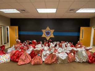The sheriff’s office halls were packed full of gift bags, bicycles, fishing poles and all sorts of different treasures for our area children.