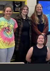 Photos submitted by Clay County School Global Studies Choice Based Program Director Ginger Scerri Four of the Hayesville High School students who plan to visit Scotland are, from left, Abigail McClure, Emillia Lackey, Grace Gibson and kneeling is Ann Gibson.