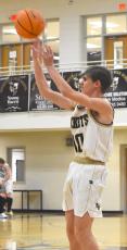 Cooper Matheson dials long distance for 3 of his 19 points in Hayesville's runaway win over Summit Charter.