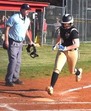 Gary Corsair • Clay County Progress Gracelynn Anderson hustles home with one of Hayesville's 26 runs against Andrews.