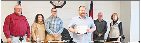 Marcia Barnes • Clay County Progress Stephen Lyvers, Clay County Schools Director of Maintenance, received recognition during the March 25 board meeting. Lyvers recently earned school electrician certifi cation.