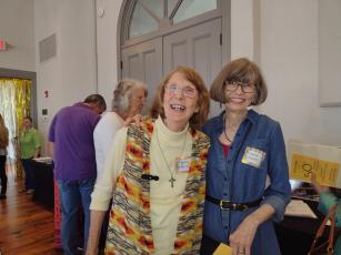 Photo by Tess Thomas Clay County Historical & Arts Council co-presidents, from left, Reba Beck and Marsha Christy, enjoy a moment together during the CCHAC 50th anniversary party.