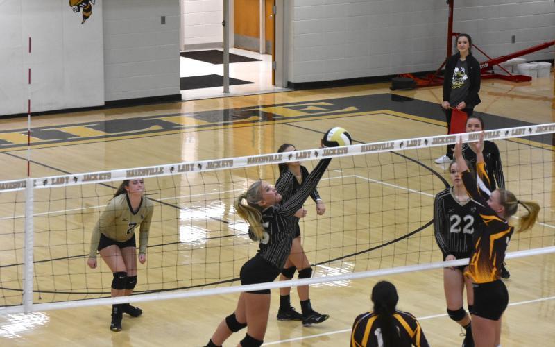 Travis Dockery • Clay County Progress Sydney Patterson slips the ball over the net against Cherokee in 2019. Current plans are for the Lady Jackets to hit the court in September.