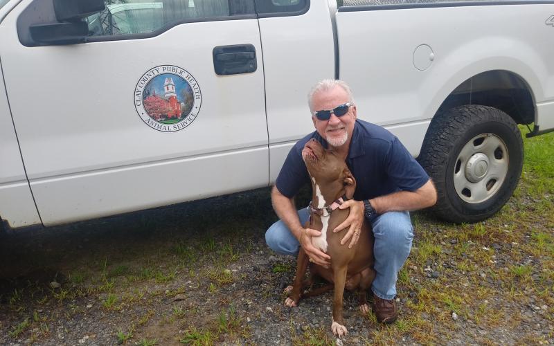 Clay County Animal Control Officer and Preparedness coordinator Glenn Dayton with his 18 month- old American Staffordshire Terrier, Maple.