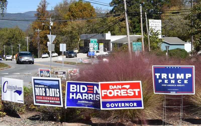 The round-a-bout in town looks more like a political candidate sign carousel.