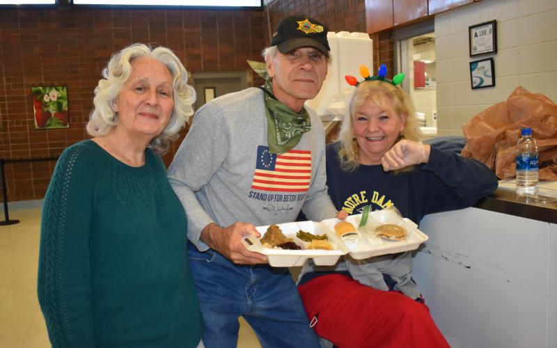 Becky Long • Clay County Progress While they didn’t get to serve the public in person, this trio served the public by preparing hundreds of take-out plates during Saturday’s dinner. They are Sheriff’s Auxiliary members, Hank and Joyce Bomberger and long-time volunteer, Marie Thompson.