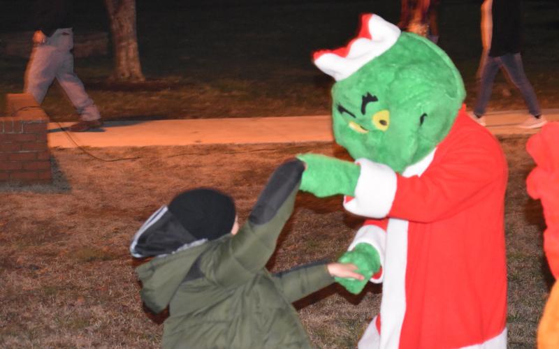 (Becky Long • Clay County Progress) We won’t get to dance in the streets with the Grinch this year, but he will return to the Hayesville square in December 2021.