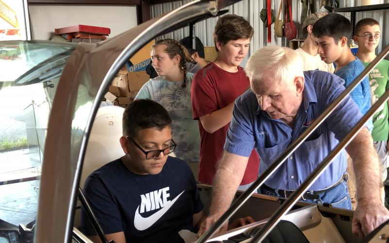 Jerry Stadtmiller gives a lesson in structure and mechanics to the aviation science class from Tri-County Early College High School.