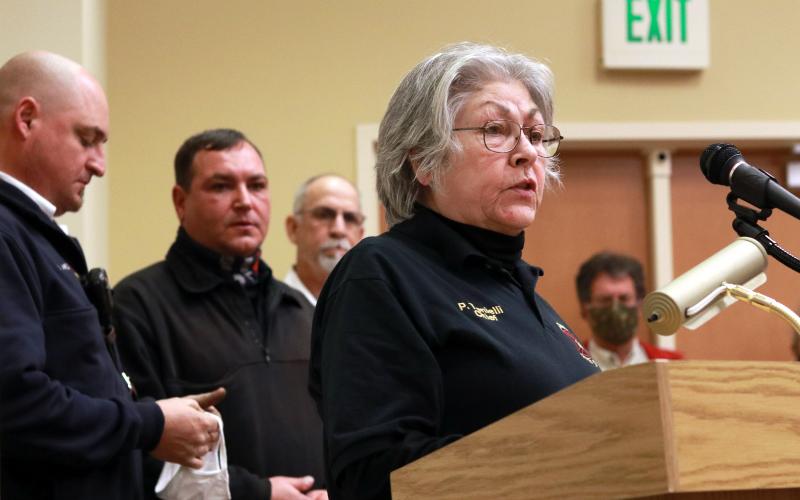 (Jared Putnam • Clay County Progress) Fire Chief Paulette Tonielli, of the Brasstown Volunteer Fire Department, speaks during the Clay County Commission m. From left, fire chiefs Brian Anderson, Henry Angelopulos and Pete Trocchia look on.