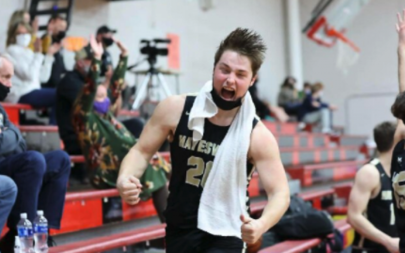 (Kelli Graves • Clay County Progress) Senior Blake McClure celebrates his teams success from the bench.