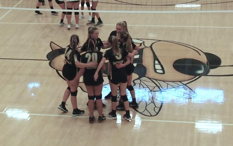 Patrick Queen • Clay County Progress The Lady Yellow Jackets celebrate an ace serve by Lilly Dockery in their win over Robbinsville.