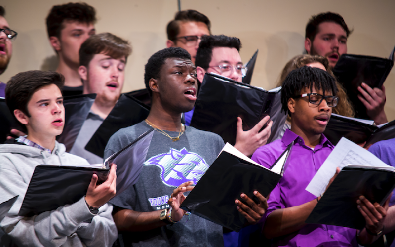 YHC choir students practice for spring events. 