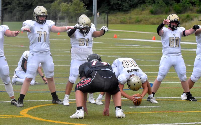 Gary Corsair • Clay County Progress Hayesville's hard-working linemen Kyle Lunsford, No. 1, Zek Furby, No. 71, Jeremy Graves, No. 51, Avery Leatherwood, No. 10, Lane O'Dell, No. 60, and Brayden Hughes, No. 52, appear to put the whammy on the Falcons prior to a point-after kick by Isaac Chandler.