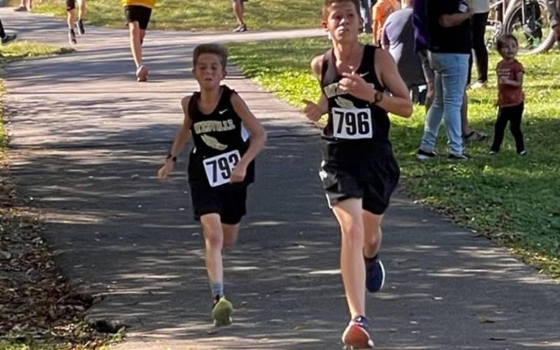 Porter Hood and Micah Moss competing at the Robbinsville Cross Country meet.