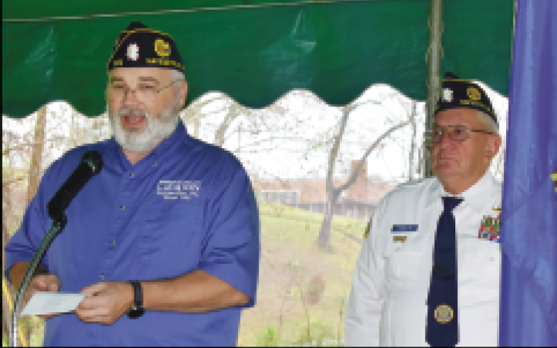 Becky Long • Progress American Legion Commander Robert Seibert is joined by Rondall Brown in recognizing veterans from all branches of military service during Friday’s ceremony.