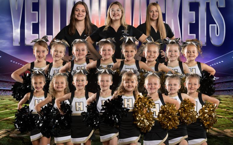 Hayesville Yellow Jacket Peewee Cheerleaders are, from, front left, Audrey Moore, Ava Whitlow, Averie Morgan, Caroline Taylor, Emorie Long, Emmalié Danico, Cheyenne Struchko and Charla Segars; second row, Jayden Jeff ries, Lakelynn Ledford, Payton Taylor, Raelyn Chaffi n, Ryleigh Ramey, Perrie Ledford, Olivia Petty and Kynleigh Cook; back, Coaches Leeanna Alberta, Emily Ledford and Kyleigh Alberta.