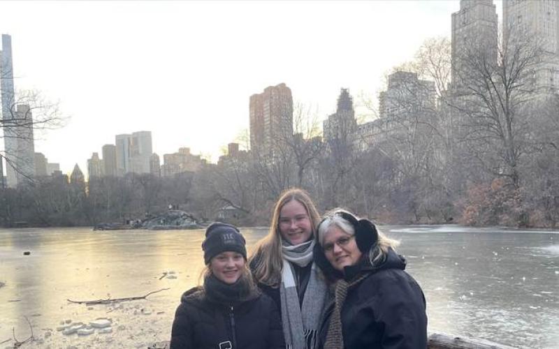 Hayesville High School German exchange student, Felicia Falk, center, is staying with Dr. Jackie Gottlieb, right, and her daughter, Lauren Gottlieb, left, until June 2023. The family traveled to New York City for Christmas break. They posed by the river with the city in the background.