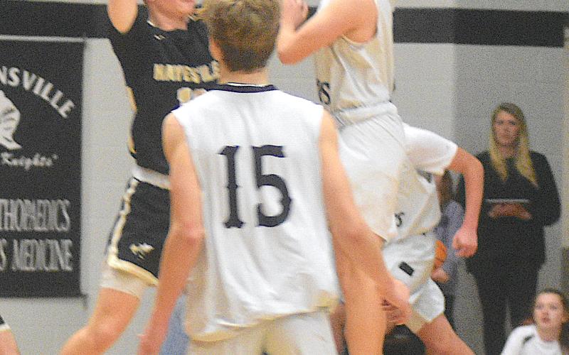 Hayesville's Peyton McGaha plays perfect defense as Robbinsville attempt the final shot of the game.