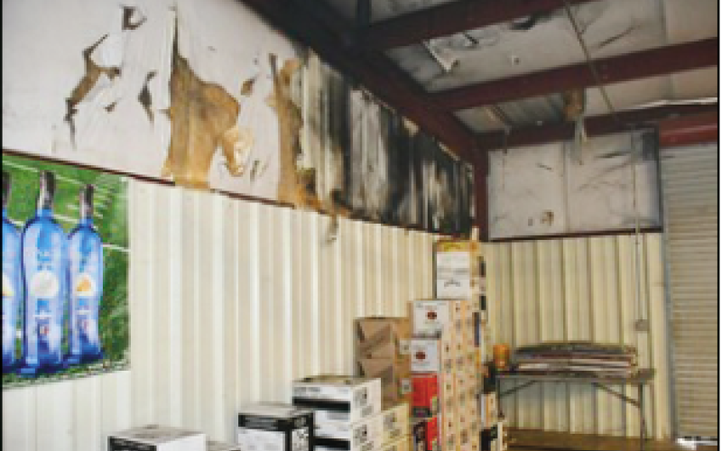 Photo submitted A Sunday fi re in the storage area of the Clay County ABC Store resulted in heavy smoke damage to the interior. A 17-year-old male has been charged in connection to the fire.