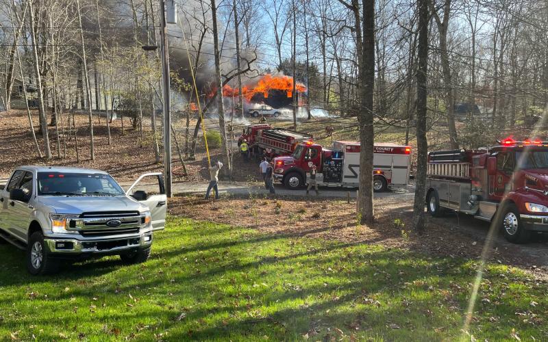 Brandon Gregory • Clay County Fire Department Loud explosions alerted the fire department to a house fire on Penland Indian trail Saturday, April 1.