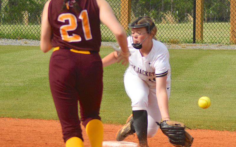 Gary Corsair • Clay County Progress Yellow Jackets second baseman Raylyn Taylor reaches for the ball on a stolen base by Cherokee.