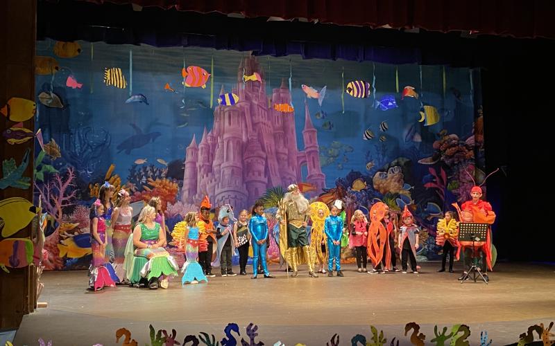 Little Mermaid cast from left: Kitty Kelly, Gracie Miller, Kaylee Hamilton, Lilly Martin, Gemma Lawrence, Violet Faulk, Eli George, Arlen Myers, Olivia Petty, Natalie George, Logan Kelly, Gracey Rodriquez, Darby Lawrence, Emma Rhodes, Lucy Hopple, Isla Hatfield, Maddy Goddard, Miles Collum, Pella Fuerch and Lincoln Carpenter.