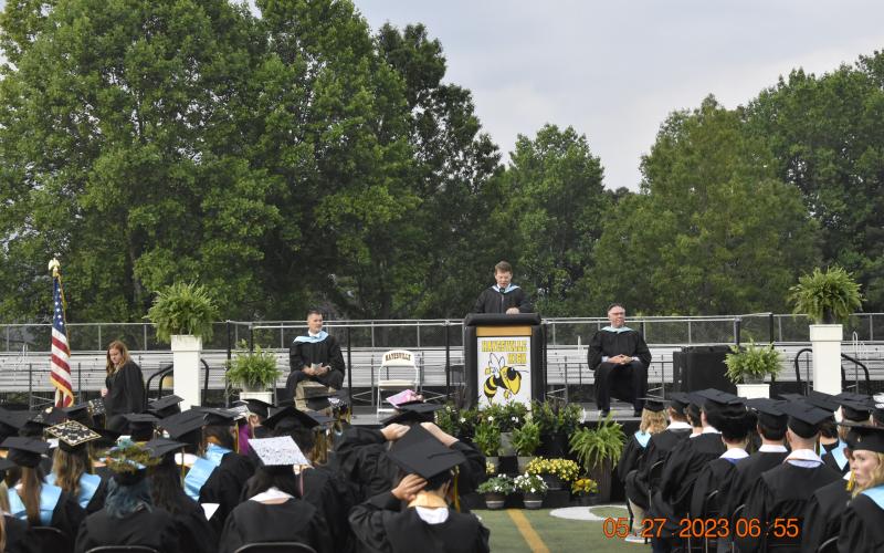 Superintendent Dale Cole presents the Challenge to the graduates. 